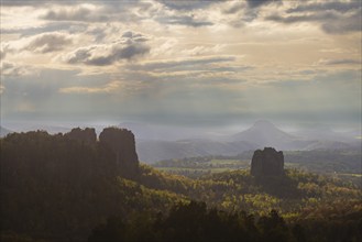 View of the Schrammstein chain, the Falkenstein and the Lilienstein from the Carolafelsen, Bad