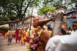 GUWAHATI, INDIA, AUGUST 19: Priests dance in the beat of Dhol (Drum) during the annual