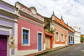 Old houses with their colorful facades on the streets and slopes of the historic city of Olinda,