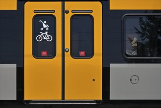 SBB passenger train door with wheelchair and pushchair symbol