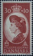 Queen Ingrid of Denmark (1910-2000), portrait in Girl Scout uniform on Danish postage stamp