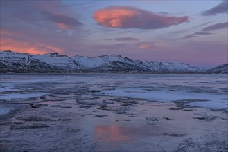 Dawn over an icy fjord, mountain landscape, Breiddalsvik, East Fjords, Iceland, Europe