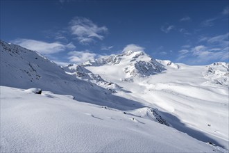 Snow-covered mountain landscape, mountain peak Monte Cevedale and glacier Zufallferner and