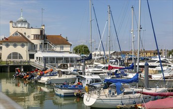 Yachts at moorings in harbour of Royal Norfolk and Suffolk yacht Club, Lowestoft, Suffolk, England,