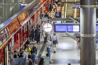 Platform with passengers, Gesundbrunnen station with Deutsche Bahn AG regional train. Berlin,