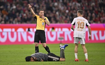 After foul, header duel duel action Florian Wirtz Bayer 04 Leverkusen (10) against Min-jae Kim FC