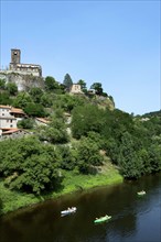 Canoeing at the foot of Chilhac village along the Allier River in Haute-Loire,