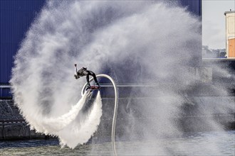 Harbour festival in Stuttgart. Spectacular jet ski and flyboard show on the Neckar. Stuttgart,