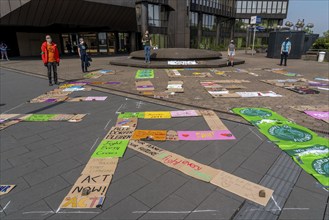 Friday For Future activists with the action, Your sign strikes for you, collected protest signs are