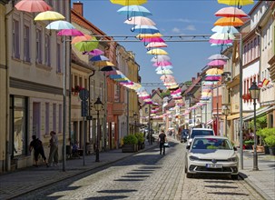 Colourful umbrellas as city decoration, old town of Eisenberg, Saale-Holzland district, Thuringia,