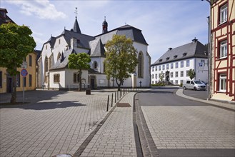 Church of St John the Baptist and administrative building of the municipality of Adenau in the town