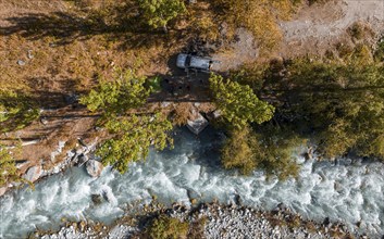 View down, aerial view, tent and camping, Ala Archa mountain stream, Ala Archa National Park,