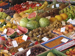 Market stall with different types of fruit and vegetables