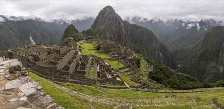 Panoramic view of Machu Picchu, with Huayna Picchu at the background, Machu Picchu, Cusco Region,