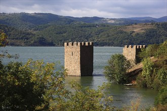 Wallachia, view of the Danube landscape, two towers, remains of the medieval fortress Trikule near