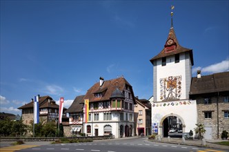 Lucerne Gate with tower clock and fresco by Seraphin Weingartner, Sempach, Canton Lucerne,