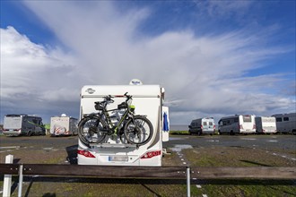 Motorhome parking space on the North Sea coast, directly on the coast, at Neuharlingersiel harbour,