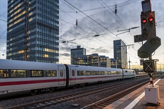 Railway station, ICE train on platform, skyline of Essen city centre, North Rhine-Westphalia,