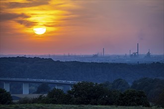 Sunset over the western Ruhr area, Ruhr valley bridge of the A52 motorway between Essen and