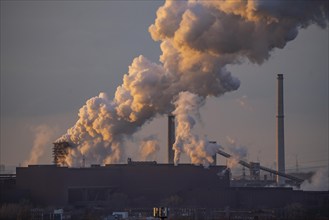 Skyline of the steel location Duisburg, Thyssenkrupp Steel Europe, in Duisburg-Bruckhausen, sunset,