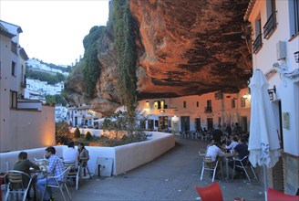 Cafes under rock cave overhang, Setenil de las Bodegas, Cadiz province, Spain, Europe