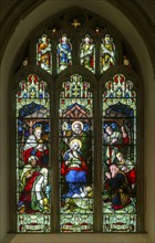 Stained glass east window of Nativity by H T Bosdet 1912, Church of Saint Mary, Kingsclere,