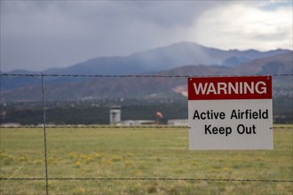 Colorado Springs, Colorado, A sign warns people not to enter the airfield at the U.S. Air Force