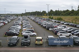 Fully occupied island car park, Norddeich, East Frisia, Lower Saxony, Germany, Europe