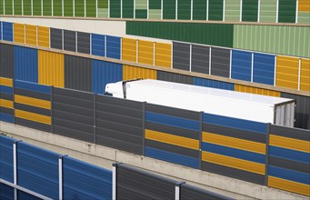 Colourful noise barriers on the A52 motorway, at the Essen-Rüttenscheid junction, the noise