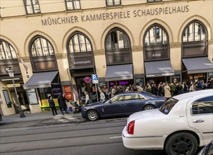 Disabled parking space in front of a trendy bar on the fashionable shopping street Maximilianstraße