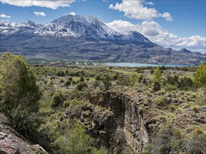 View over a canyon to village Puerto Ingeniero Ibanez located at lake Lago General Carrera,