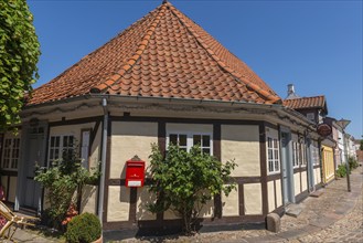 Odense, cobblestone street in the old town, half-timbered house, colourful houses, Fyn, island of