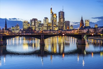 Skyline of the city centre of Frankfurt am Main, river Main, dusk, Ignatz-Bubis-Brücke, Hesse,