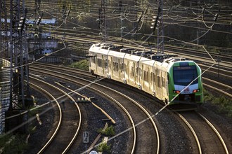 S-Bahn train on the tracks, railway layout, railway line west of the main station of Essen, North