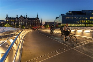 Cyclists on the Lille Langebro cycle and pedestrian bridge over the harbour, Copenhagen is