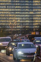 City centre traffic, Danziger Straße, B8, Düsseldorf, high-rise office building, evening traffic,