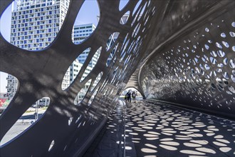 Light effects from the sun in the Parkbruk, a cycle and pedestrian bridge in the city centre of