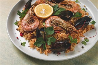 Seafood paella, shrimp and mussels risotto, rice, homemade, top view, no people