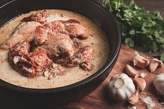 Shkmeruli, fried chicken, in milk-garlic sauce, Georgian cuisine, homemade, close-up, no people