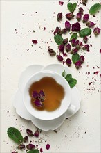 Cup of tea, damask rose, pink tea, close-up