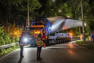 Transport of a 68 metre long, 22 tonne blade of a wind turbine, here in Schwelm, with a