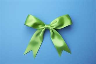 Green silk ribbon on blue background. KI generiert, generiert AI generated