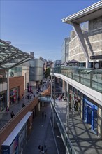 Modern shopping centre with glass façade on a sunny day, Liverpool