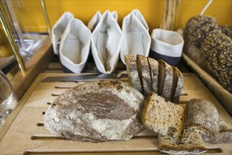 Homemade Bread on Wood with Textile Bags in Switzerland