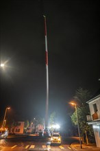 Transport of a 68 metre long, 22 tonne blade of a wind turbine, here in Breckerfeld, with a