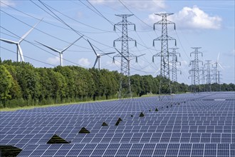 High-voltage power line route, the space underneath is used for a solar park over 5 km long, behind