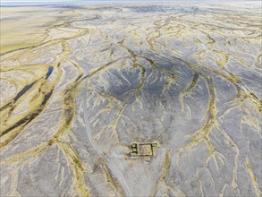 Sheep paddock on the glacial floodplains of the Vatnajökull glacier, aerial view, Iceland, Europe