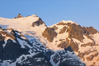 First light hits summit of Hinter Tierberg, Mittler Tierberg and Vorder Tierberg, with