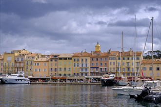 Dark clouds over the harbour of Saint Tropez, Var, French Riviera, Provence-Alpes-Cote d'Azur, Cote