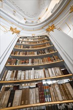 Close-up of high bookshelves in a historic library room, Weimar, Germany, Europe